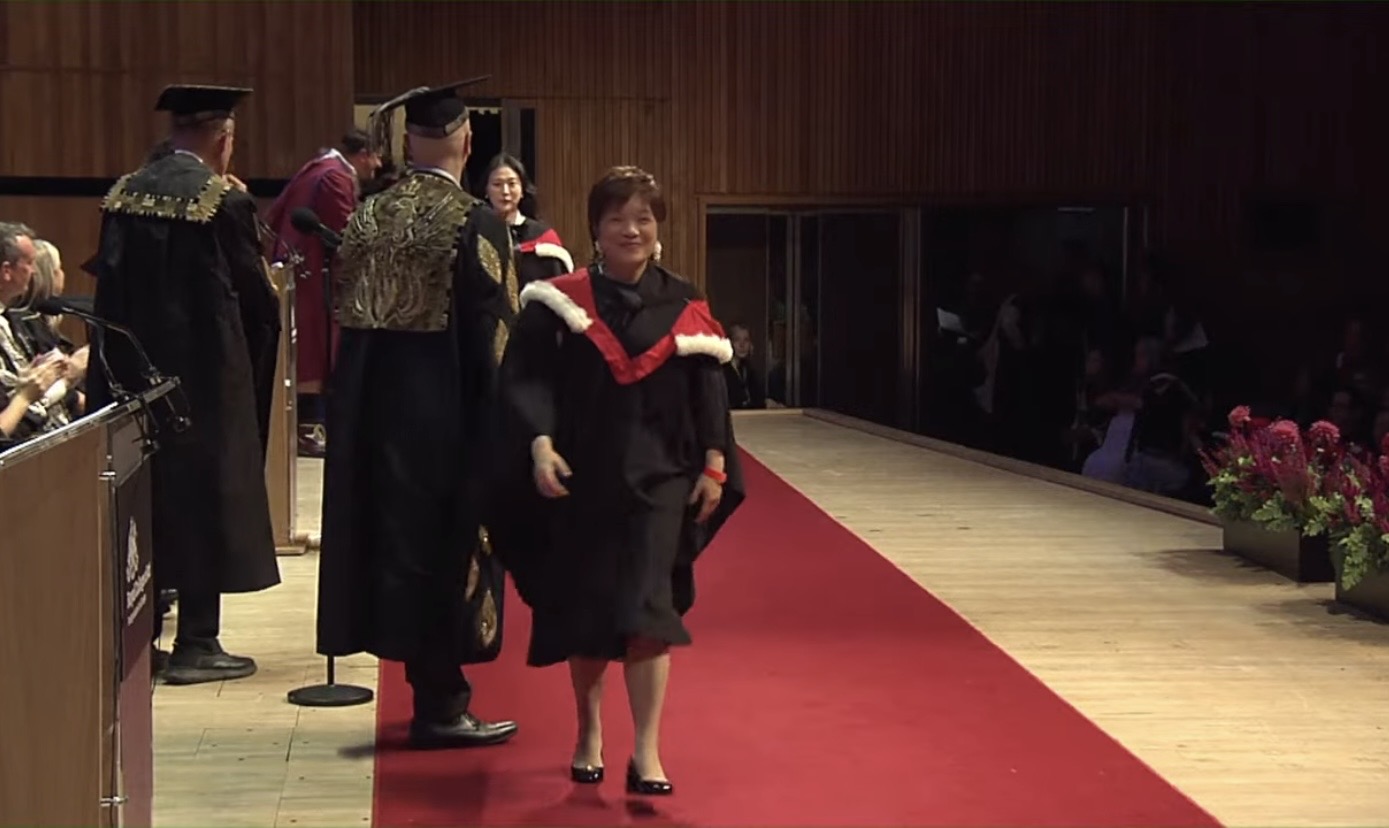 Yellon receiving her MA degree